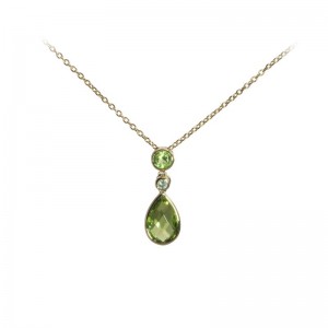 Peridot With Diamond Accents by Olivia B
