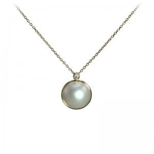 Pearl Mabe with Diamond